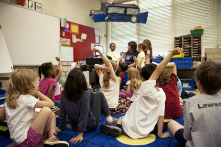 Photo of children and teacher in class 